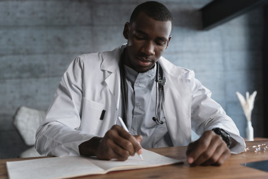 a doctor writing